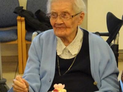 Sr. Anne Marguerite with birthday cake